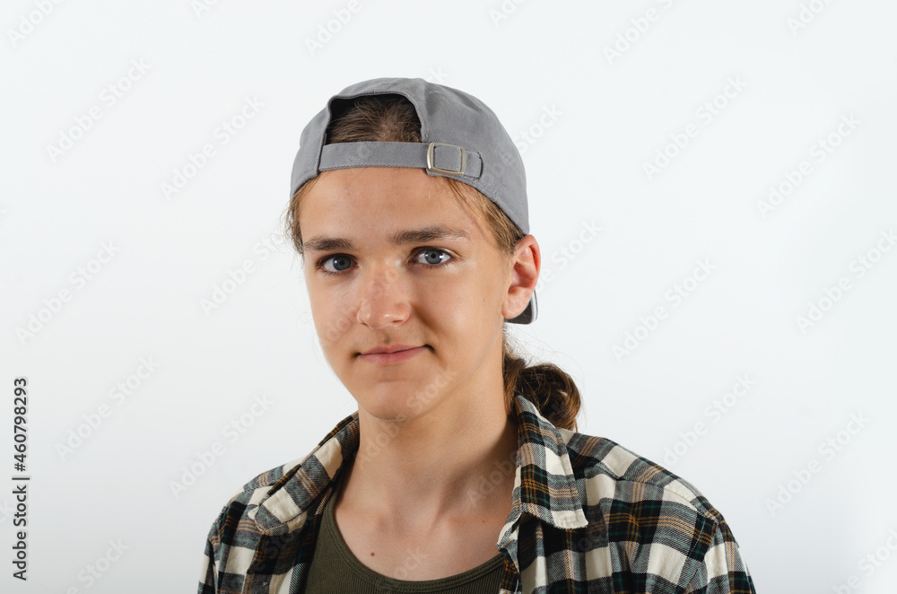 Fototapeta premium Portrait of guy in grey cap