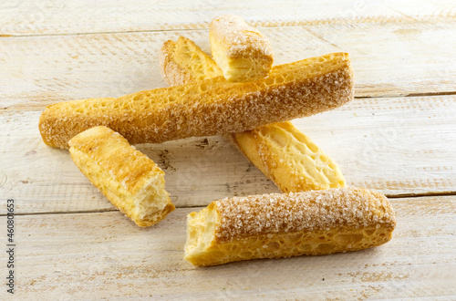 image of cookie sticks on wood table close-up photo