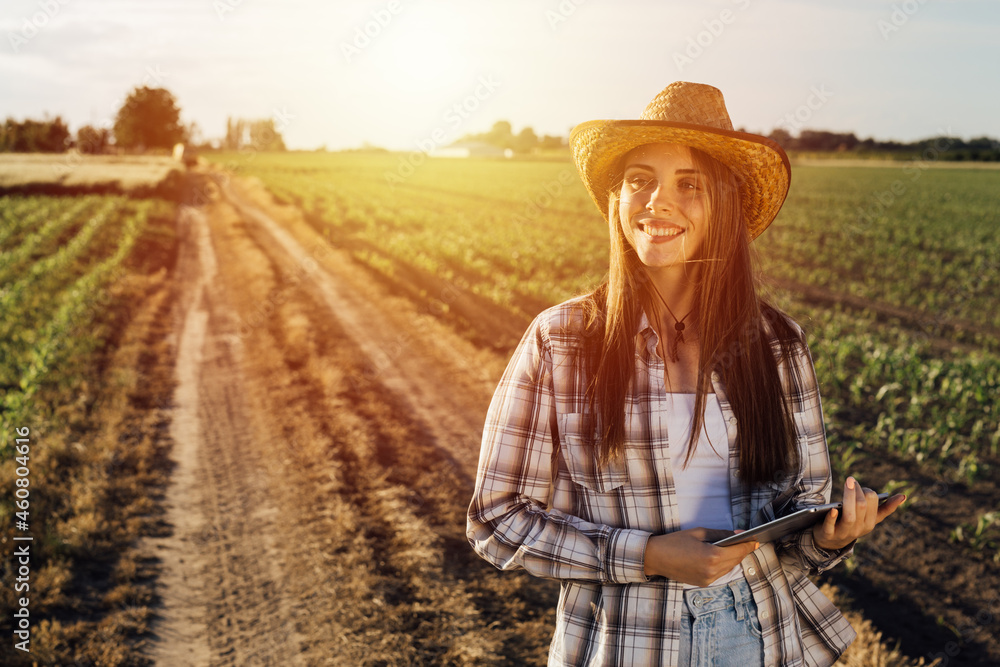 woman farmer walking outdoor - obrazy, fototapety, plakaty 