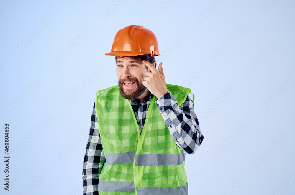 bearded man green vest orange helmet workflow hand gestures Studio bearded man green vest orange helmet workflow hand gestures Studio