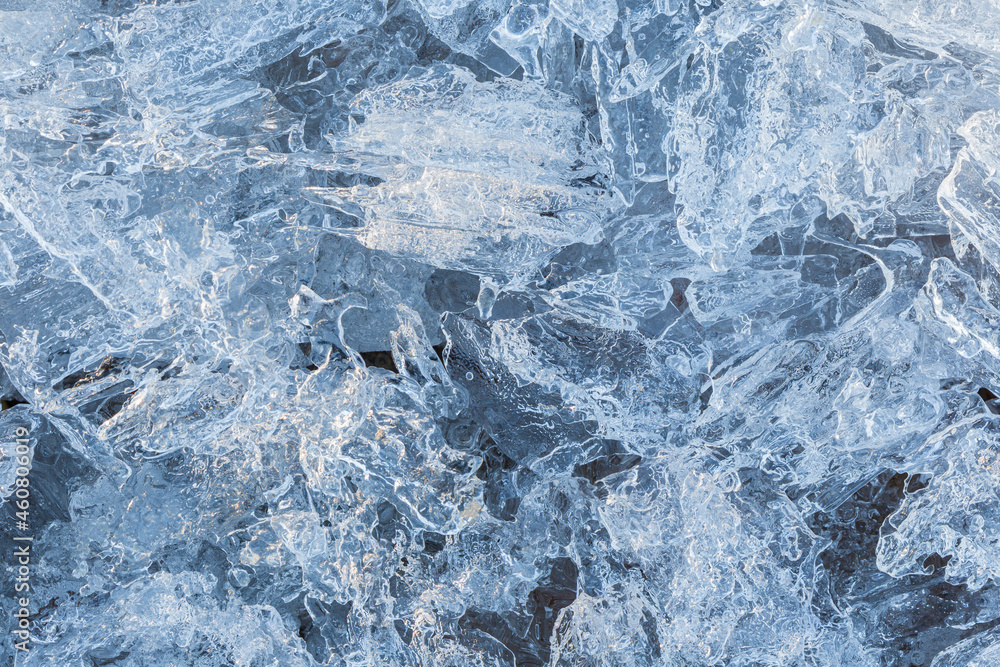 Obraz premium Macro close-up of abstract ice formations in the winter, viewed from above. Abstract full frame textured background. Copy space. Top view.