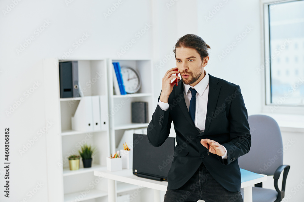 manager in the office with documents executive manager in the office with documents executive