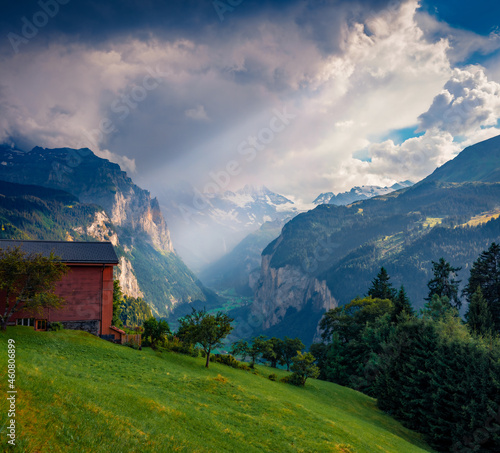 Dramatic summer view of Wengen village. Spectacular mornig scene of Swiss Alps, Bernese Oberland in the canton of Bern, Switzerland, Europe. Traveling concept background.