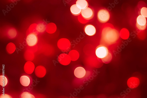 red glitter vintage lights background. red bokeh shiny on dark background.