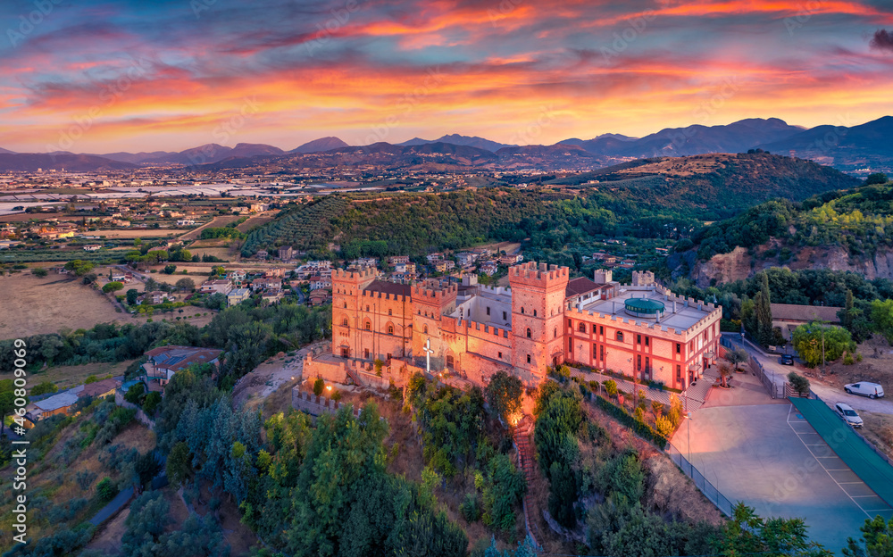 Obraz premium Majestic morning view from flying drone of Castelluccio Castle. Great sunrise on Battipaglia town, Italy, Europe. Traveling concept background.