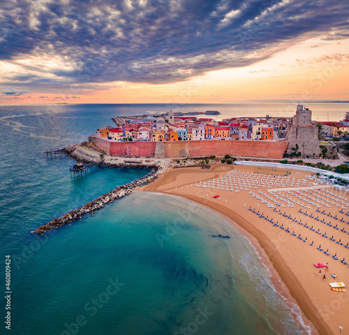 Fantastic summer view of Sant'Antonio beach. Colorful morning cityscape of Termoli port. Dramatic sunrise on Adriatic sea. Traveling concept background..