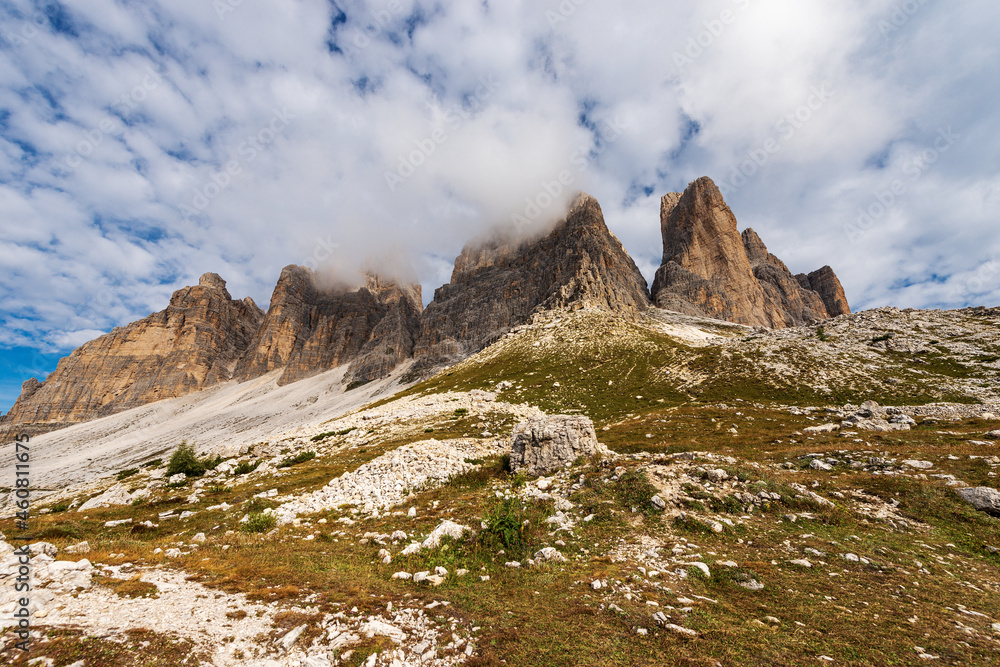South rock face of three peaks of Lavaredo (Drei Zinnen or Tre Cime di Lavaredo), mountain peaks of the Sesto Dolomites, UNESCO world heritage site, Trentino-Alto Adige and Veneto, Italy, Europe.