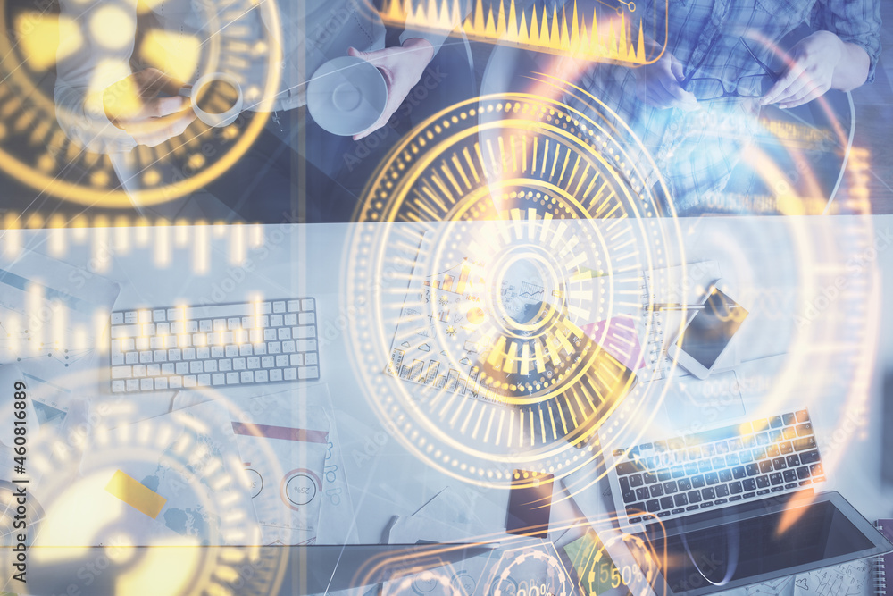 Double exposure of man and woman working together and technology theme drawing. Computer background. Top View. High tech concept. Double exposure of man and woman working together and technology theme drawing. Computer background. Top View. High tech concept.