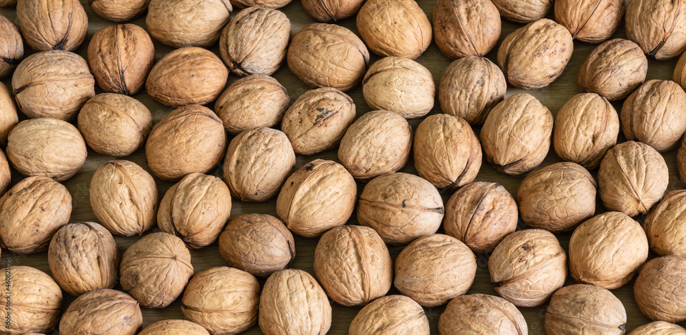 Background of healthy walnuts in shell. Background of healthy walnuts in shell.