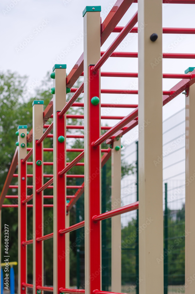Sports ground with a variety of horizontal bars. Open area for s Sports ground with a variety of horizontal bars. Open area for s