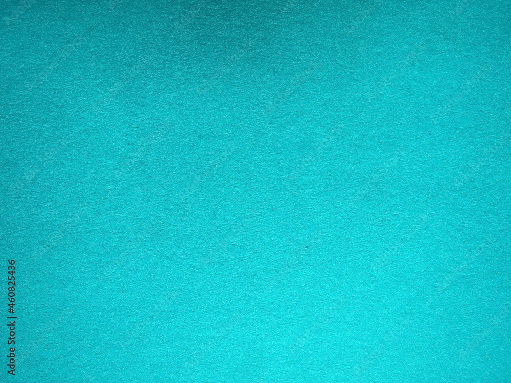 Paper textured background. The color of the paper is blue. Place for text Paper textured background. The color of the paper is blue. Place for text