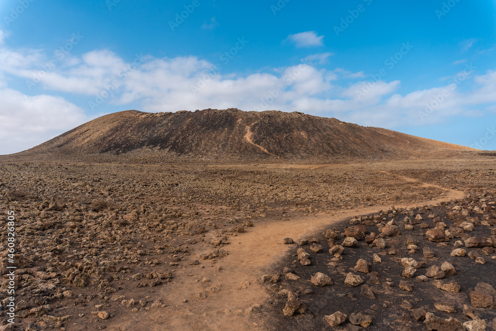 Beautiful trail to the Crater of the Calderon Hondo volcano near Corralejo, north coast of the island of Fuerteventura, Canary Islands. Spain