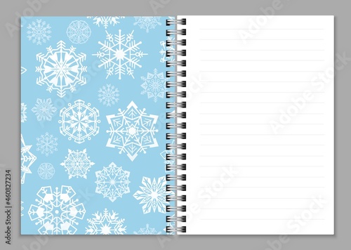 Open notebook realistic. Copybook or sketchbook, notepad or copybook with ring spiral bound pages and white snowflakes blue colored cover. Winter holidays stationery. Vector illustration