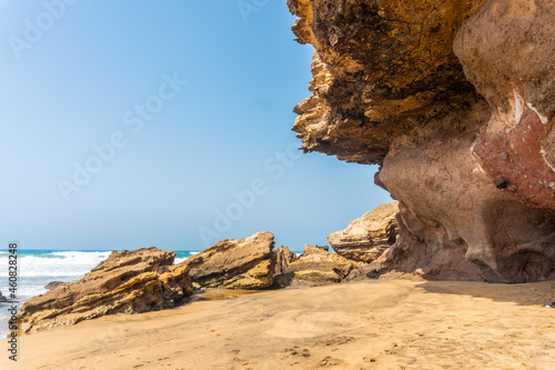 It looks like natural stones next to the sea in Playa de Garcey, west coast of Fuerteventura, Canary Islands. Spain