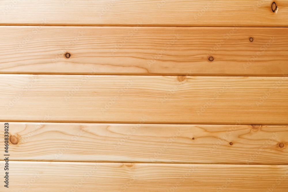 Fototapeta premium Boards of light natural wood as a background texture. Top view. Copy, empty space for text
