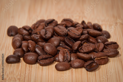 Fototapeta Naklejka Na Ścianę i Meble -  coffee beans on wooden background