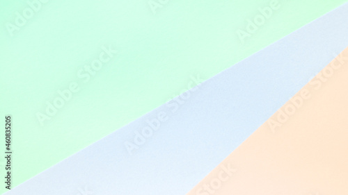 Background in trendy multicolor paper.Top view. Minimal concept.