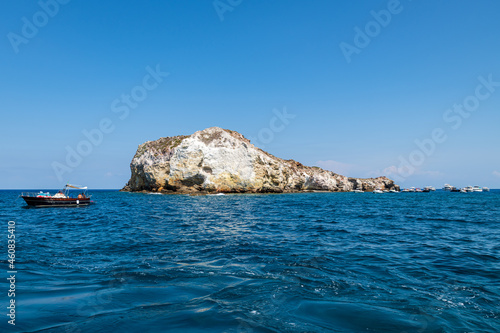 Panarea island (Aeolian archipelago), Lipari, Messina, Sicily, Italy, 08.21.2021: view of the rocky coast of "Lisca Bianca" island. 