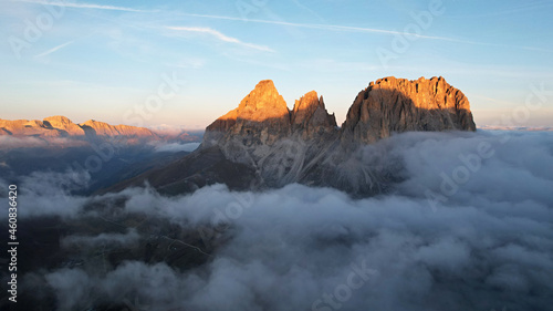 Mountains in the clouds at sunrise. Italian Dolomites © pettys