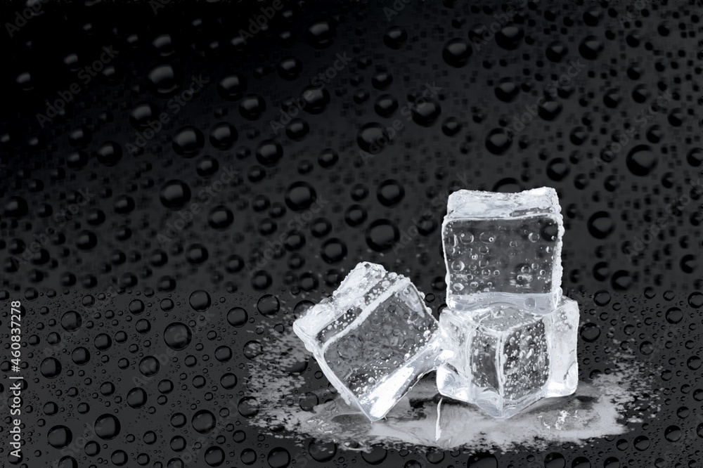 Cold clean ice cubes with drops on the desk Cold clean ice cubes with drops on the desk