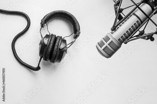 Background with a professional microphone and headphones