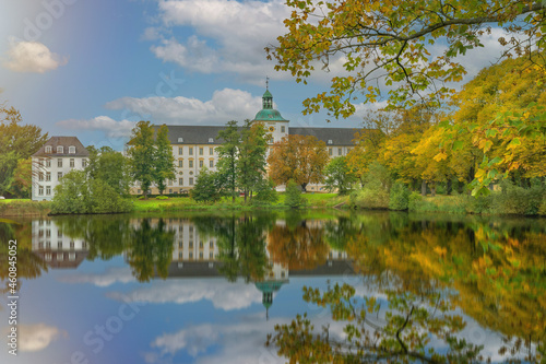 Autumnafternoon in the castle. Autumn park with pond. Castle Gottorf in the city of Schleswig, Schleswig-Holstein, Germany.  photo