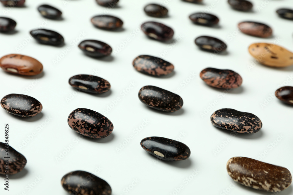 Flat lay composition with black beans on white background Flat lay composition with black beans on white background