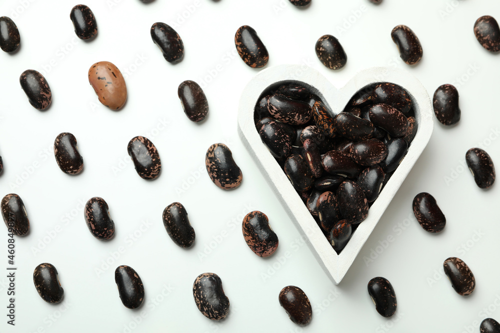 Flat lay composition with beans and heart with beans on white background Flat lay composition with beans and heart with beans on white background