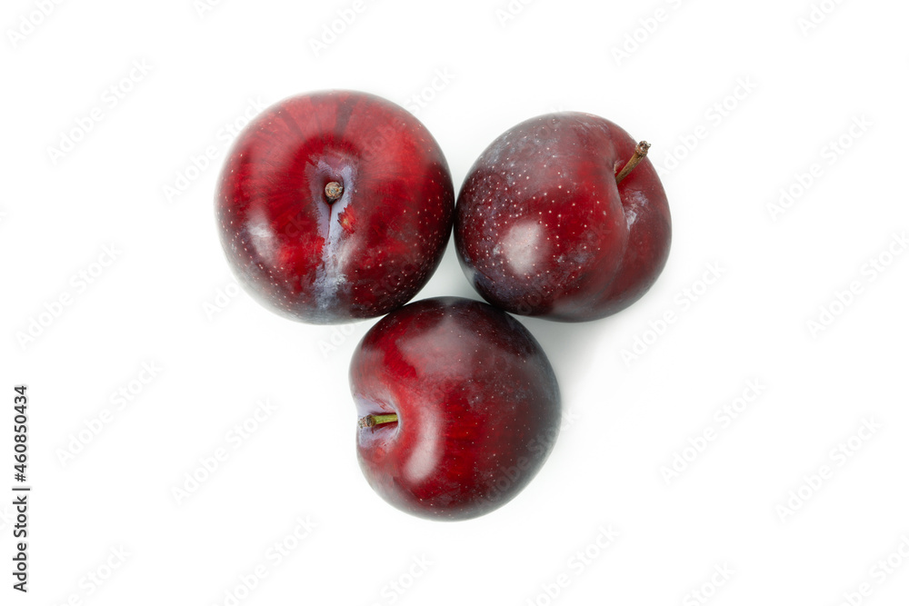 Plums, isolated on white background, top view