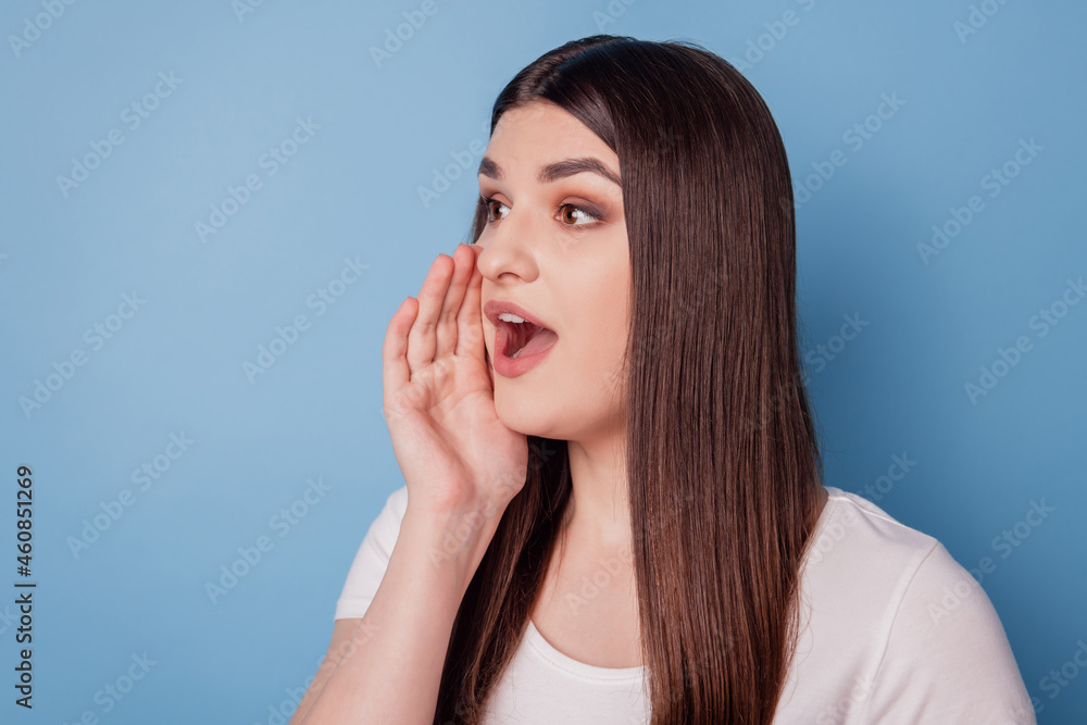 Portrait of pretty promoter gossip lady palm open mouth look empty space share recent news on blue background Portrait of pretty promoter gossip lady palm open mouth look empty space share recent news on blue background