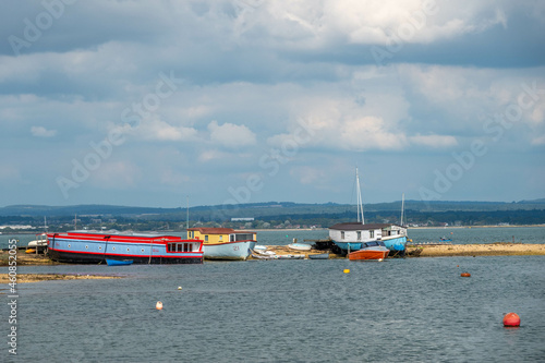colourful houseboats by the sea on Hayling Island Hampshire England