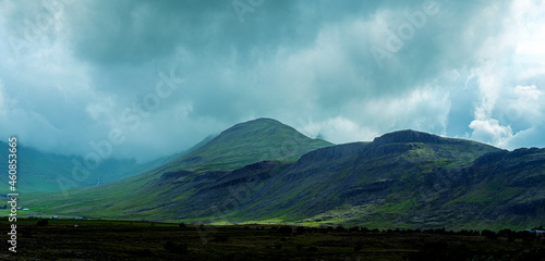 Heavy clouds and mountain landscape in Iceland. photo