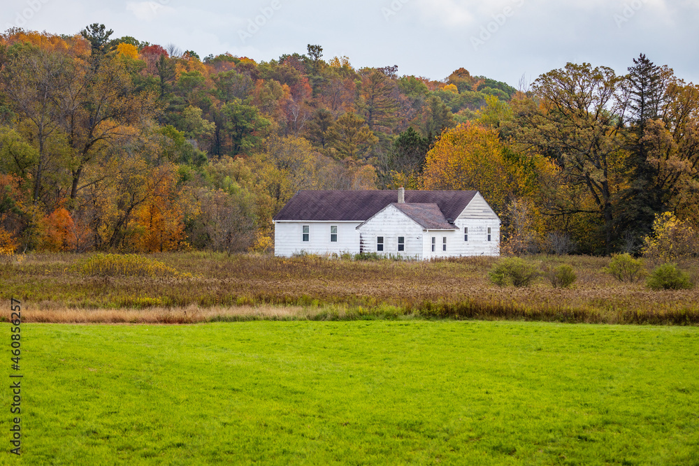 Old building in the distance during autumn in Graytown, Dunn County Wisconsin
