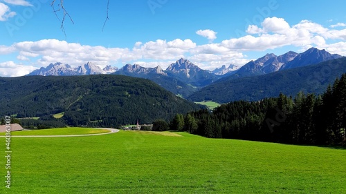 Green valley and Dolomites