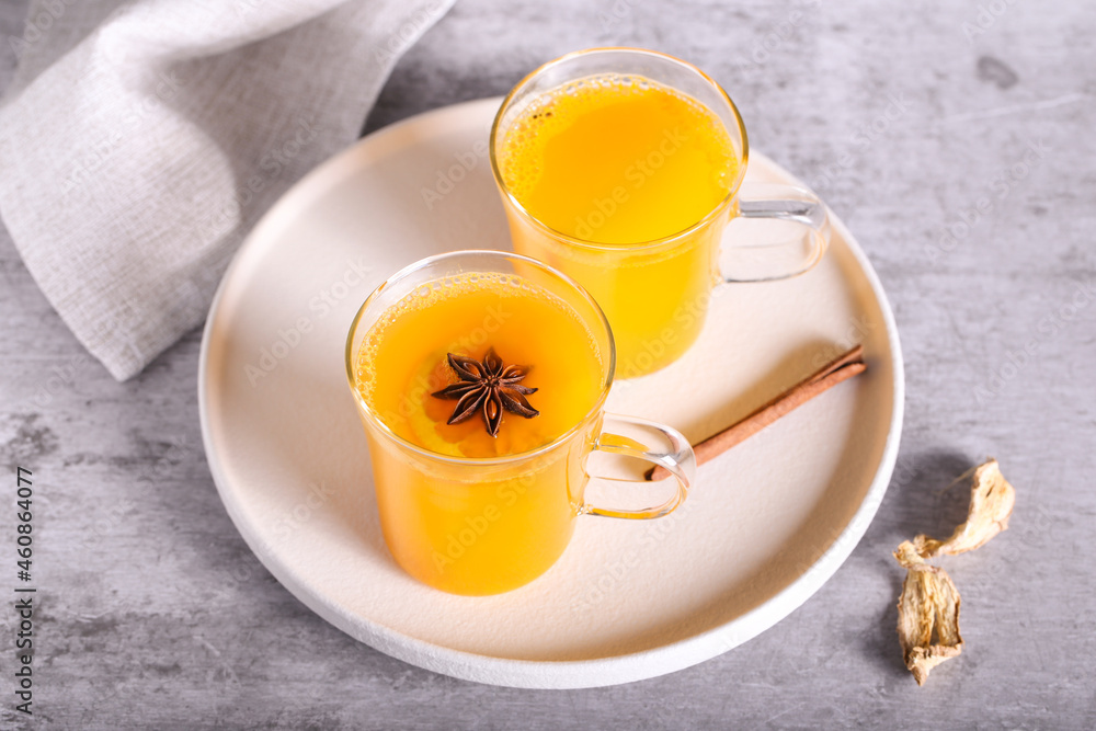 Tea with sea buckthorn and spices is on the table Tea with sea buckthorn and spices is on the table