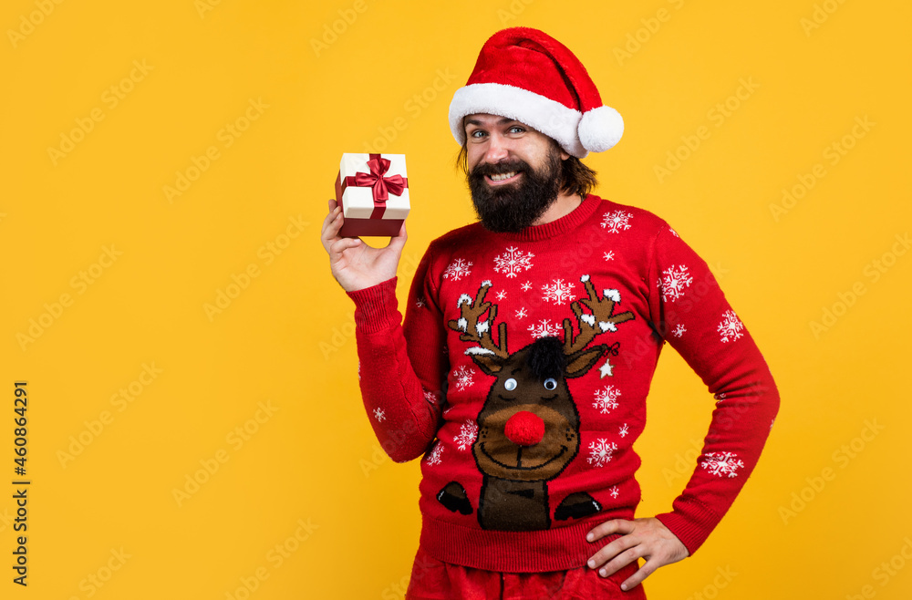happy bearded man in santa claus costume celebrate winter holiday of chistmas and feel merry about xmas gifts, christmas gift