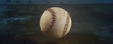 Abstract view of baseball with shallow depth of field and blurred background.