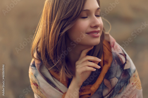 Beautiful women. Portrait of a young attractive girl at sunset. High quality photo