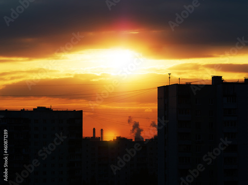 Sunset at sleeping industrial district in Moscow background