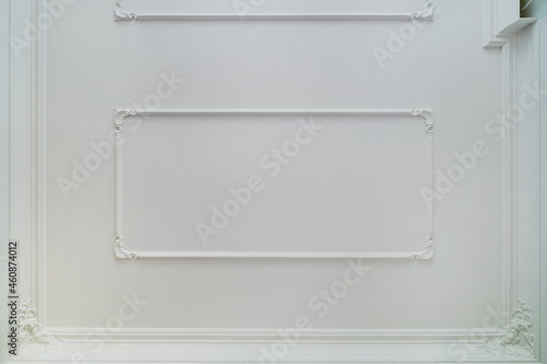 Detail of corner ceiling cornice with intricate crown molding.