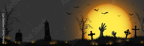 Halloween zombie hands in front of full moon