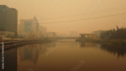The city of Yakutsk in the smoke from forest fires in Yakutia in 2021 photo