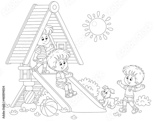 Happy little kids playing on a colorful toy slide on a playground in a summer park on a sunny day, black and white outline vector cartoon illustration for a coloring book page