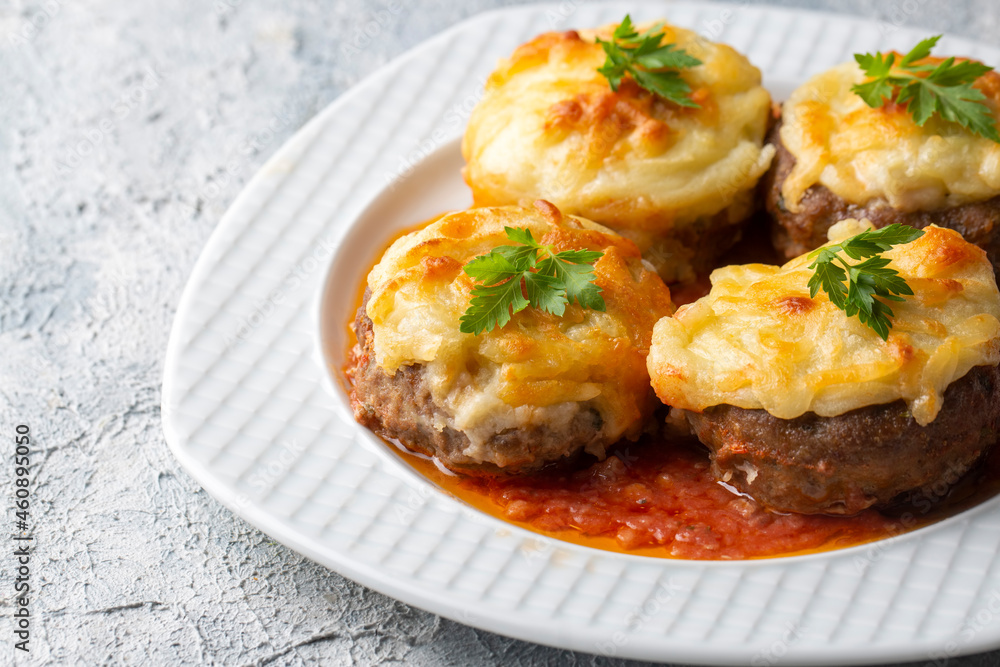 Turkish Food Hasanpasa Kofte - Kofta with Puree - Meatball with Bechamel Sauce and Green Peas. Traditional Food. Turkish Food Hasanpasa Kofte - Kofta with Puree - Meatball with Bechamel Sauce and Green Peas. Traditional Food.