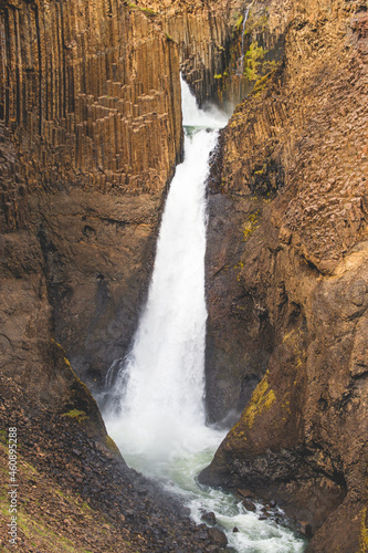 Basalt columns and Litlaness waterfall in East Iceland 