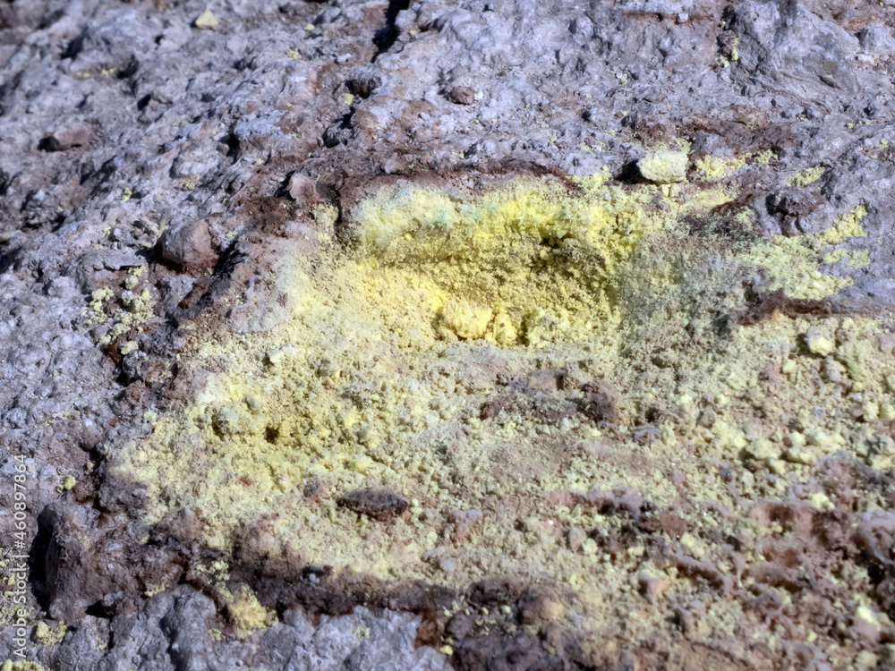 Poisonous sulfur close-up at the bottom of a volcano crater on the island of Nisyros in Greece Poisonous sulfur close-up at the bottom of a volcano crater on the island of Nisyros in Greece