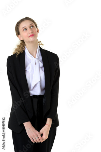 Portrait of surprised girl in elegant black suit