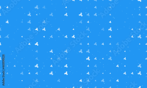 Seamless background pattern of evenly spaced white spinner symbols of different sizes and opacity. Vector illustration on blue background with stars