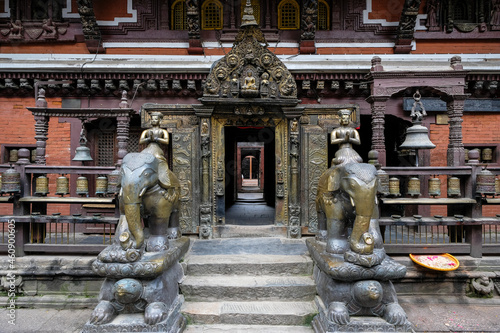 Patan, Nepal - October 2021: The Golden Temple is a Buddhist monastery founded in the 12th century in Patan on October 3, 2021 in Kathmandu Valley, Nepal.