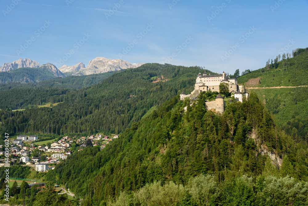 Hohenwerfen castle and fortress on top of the hill and surrounded by the high mountains of the Alps, Werfen, Salzburg, Austria